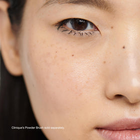 Clinique powder texture close-up highlighting superfine, silky finish benefit