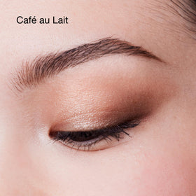 Clinique Café Au Lait swatches on arm illustrating shade payoff and blendability