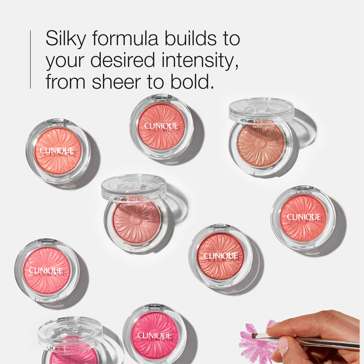 Clinique close-up of silky powder texture showing smooth blendability benefit