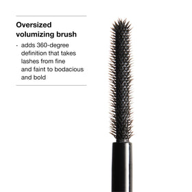 Clinique Chubby Lash rich black texture swipe on white, demonstrates buildable pigment