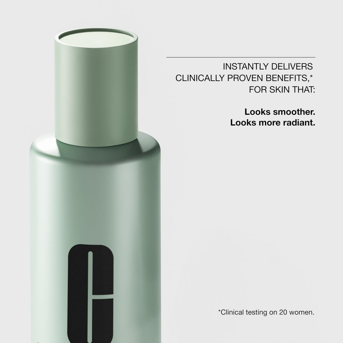 Clinique bottle cap and label close-up highlighting gentle formula