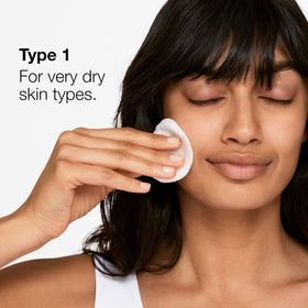 Clinique Clarifying Lotion 1 next to common bottle for scale and quantity clarity