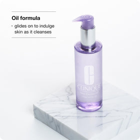 Clinique cleansing oil texture close-up demonstrating lightweight, spreadable feel