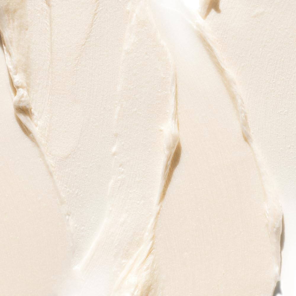 Clinique Deep Comfort lather closeup on hand illustrating creamy texture and gentle cleanse