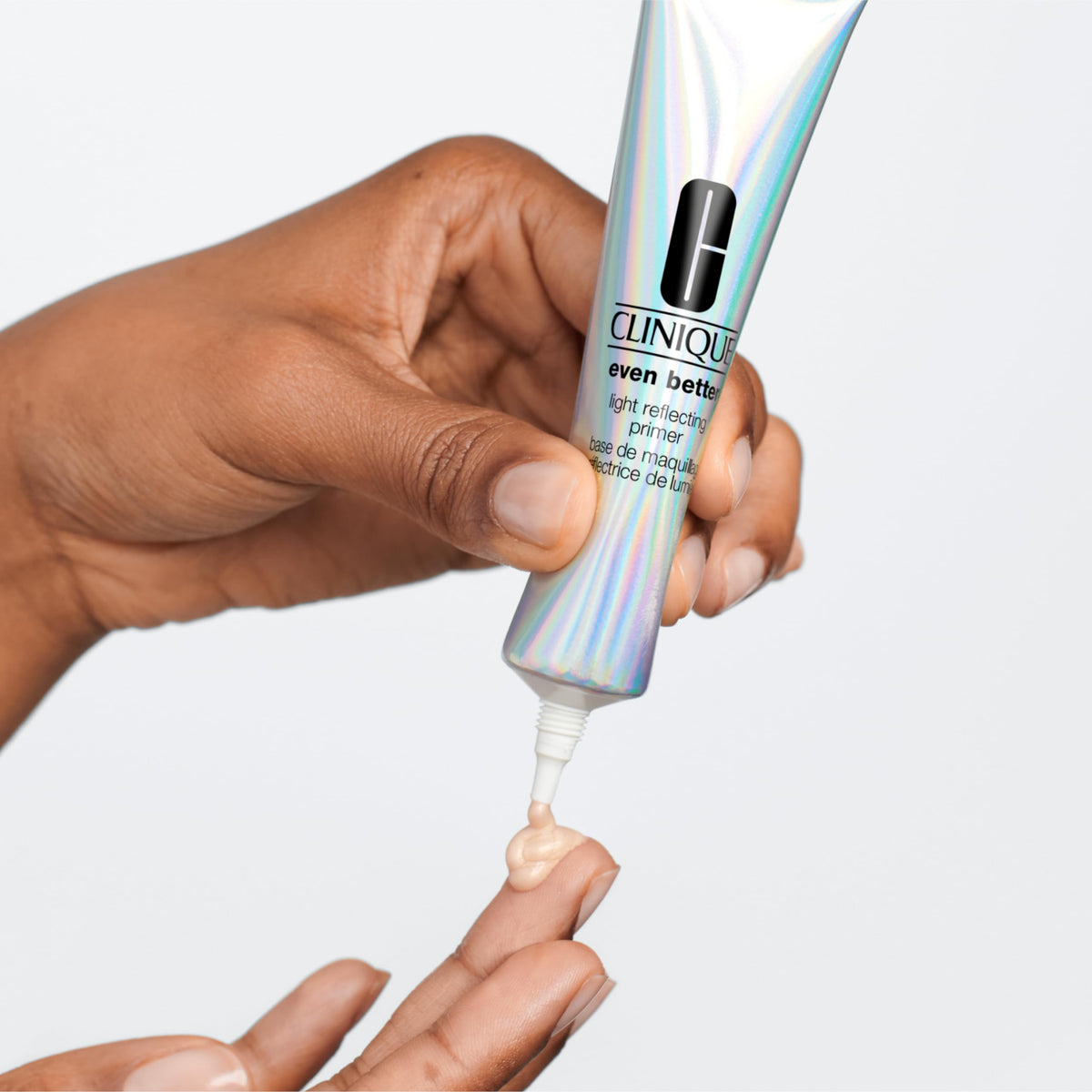 Clinique product applied to skin demonstrating smooth, luminous base for makeup