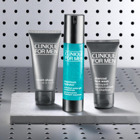 Clinique For Men size comparison beside ruler showing compact 1.6 fl oz convenience
