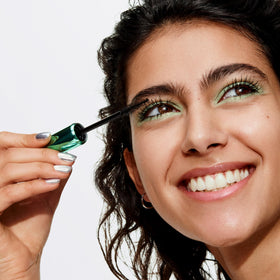 Clinique gel texture swipe with fibers visible, demonstrates buildable volume