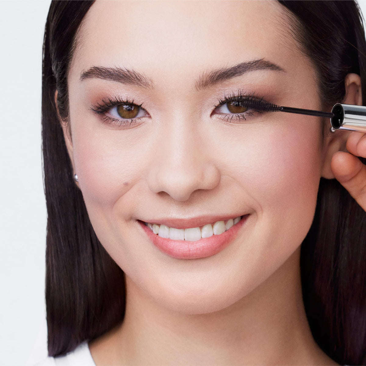 Clinique before-and-after lashes showing length and separation improvement
