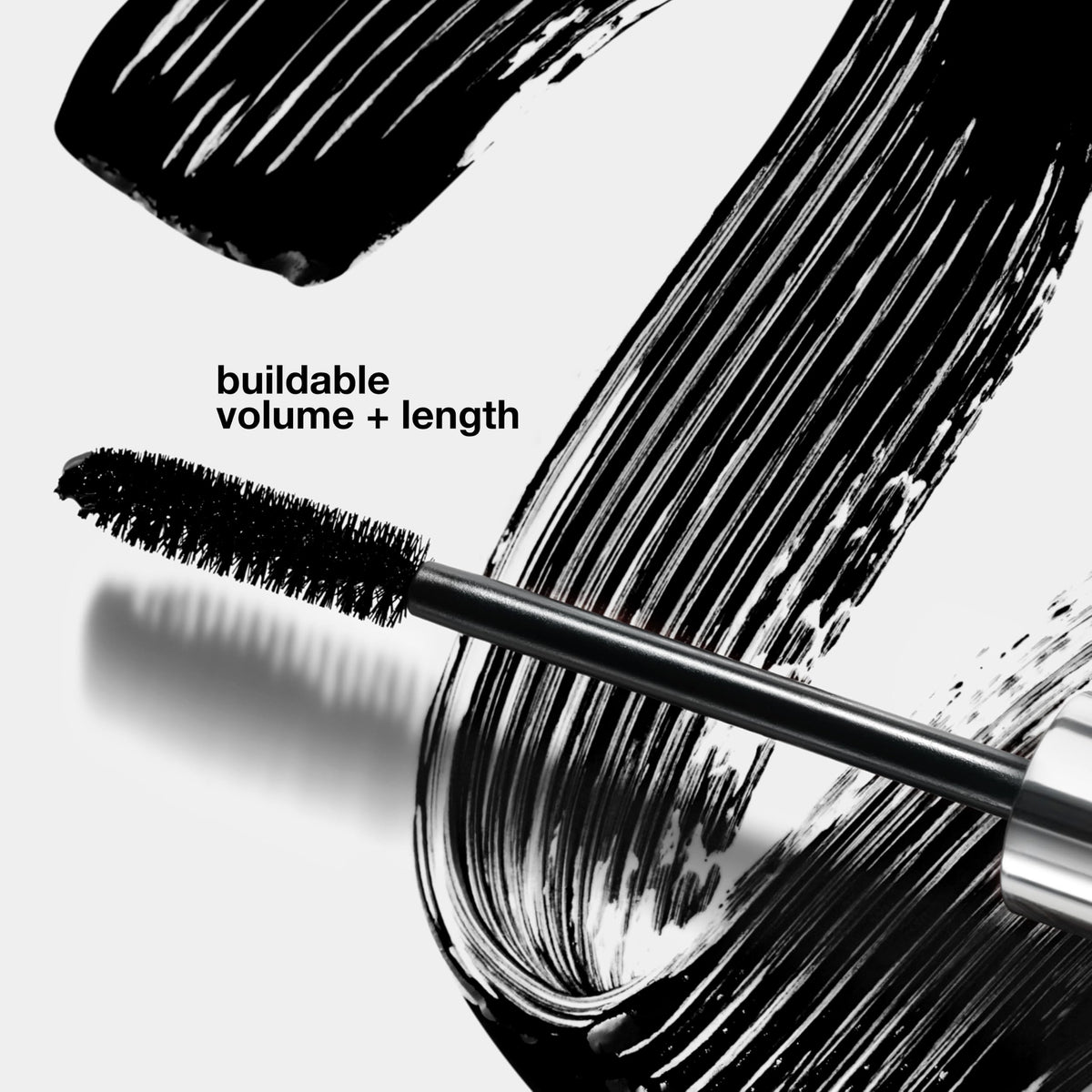Clinique black mascara swatch on skin illustrating rich pigment and smooth finish