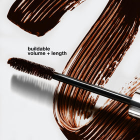 Clinique mascara texture swatch on skin, demonstrating smooth buildable coverage benefit