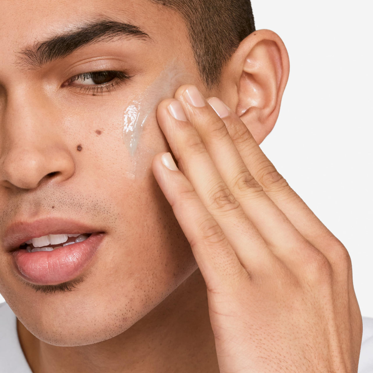 Clinique product dispensed in hand showing easy absorption and control