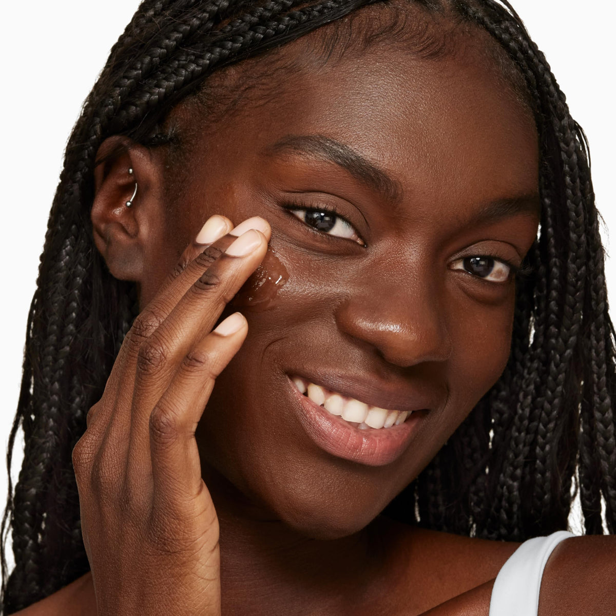 Clinique serum applied on hand demonstrating lightweight spreadability and immediate hydration