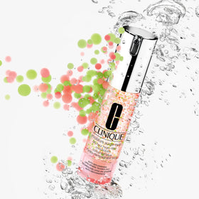 Clinique travel-size jar held in hand highlighting compact convenience for on-the-go hydration
