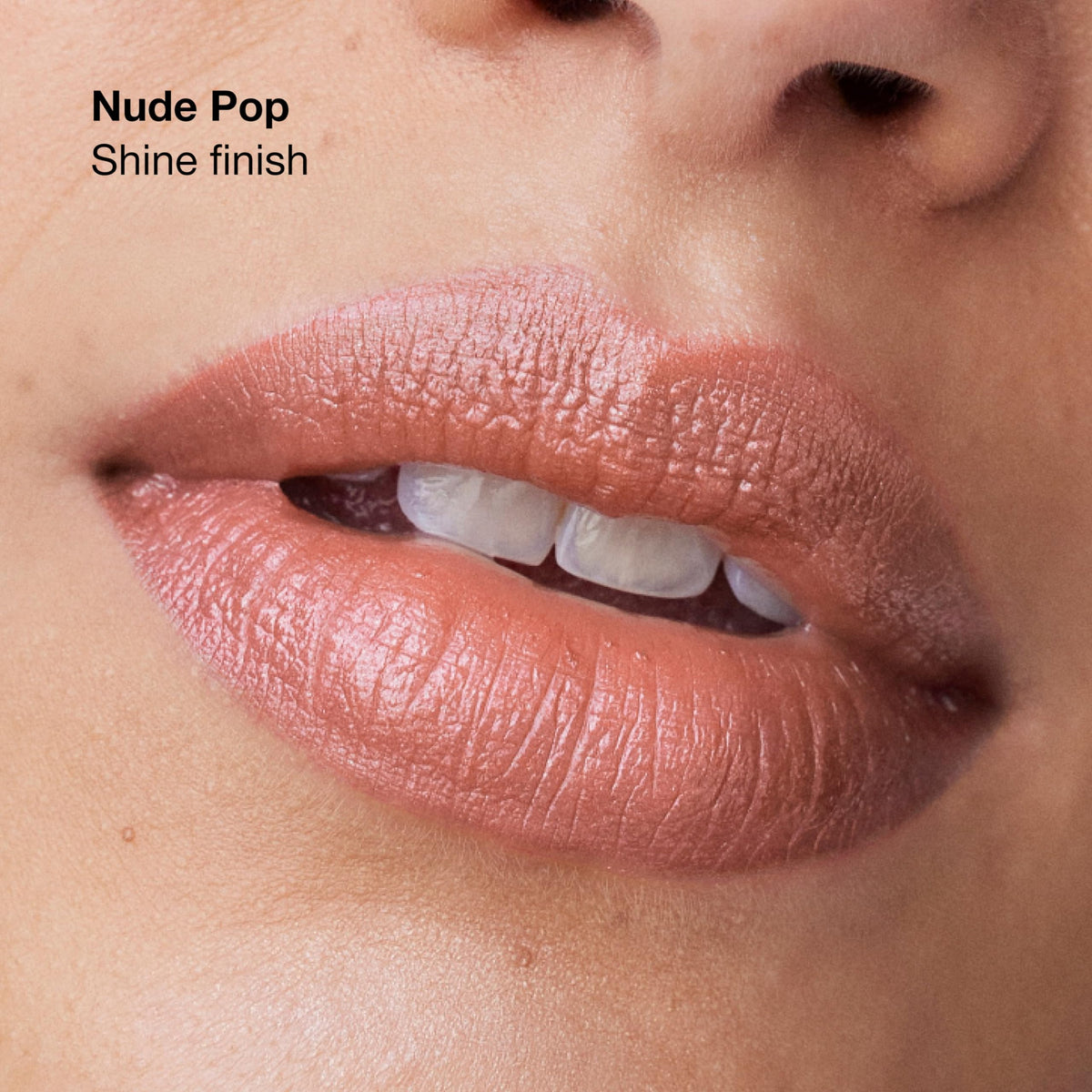 Clinique Pop applied on lips in lifestyle setting for natural wear