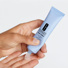 Clinique primer next to foundation showing compatible base and longer wear
