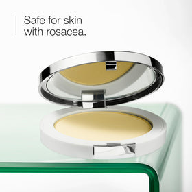 Clinique compact open top view showing powder pan and applicator for quick correction