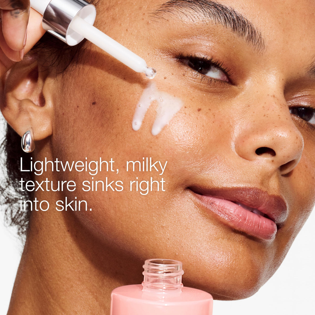 Clinique serum blended with moisturizer showing how it layers smoothly under makeup