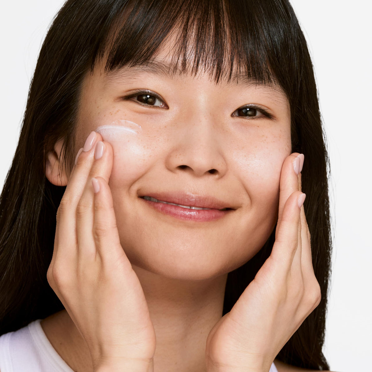 Clinique label close-up showing SPF 20 and brightening claim for informed choice