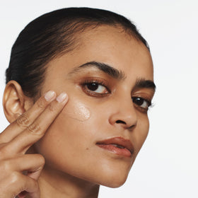 Clinique Superbalanced texture close-up on skin, showing smooth blend and hydrating effect