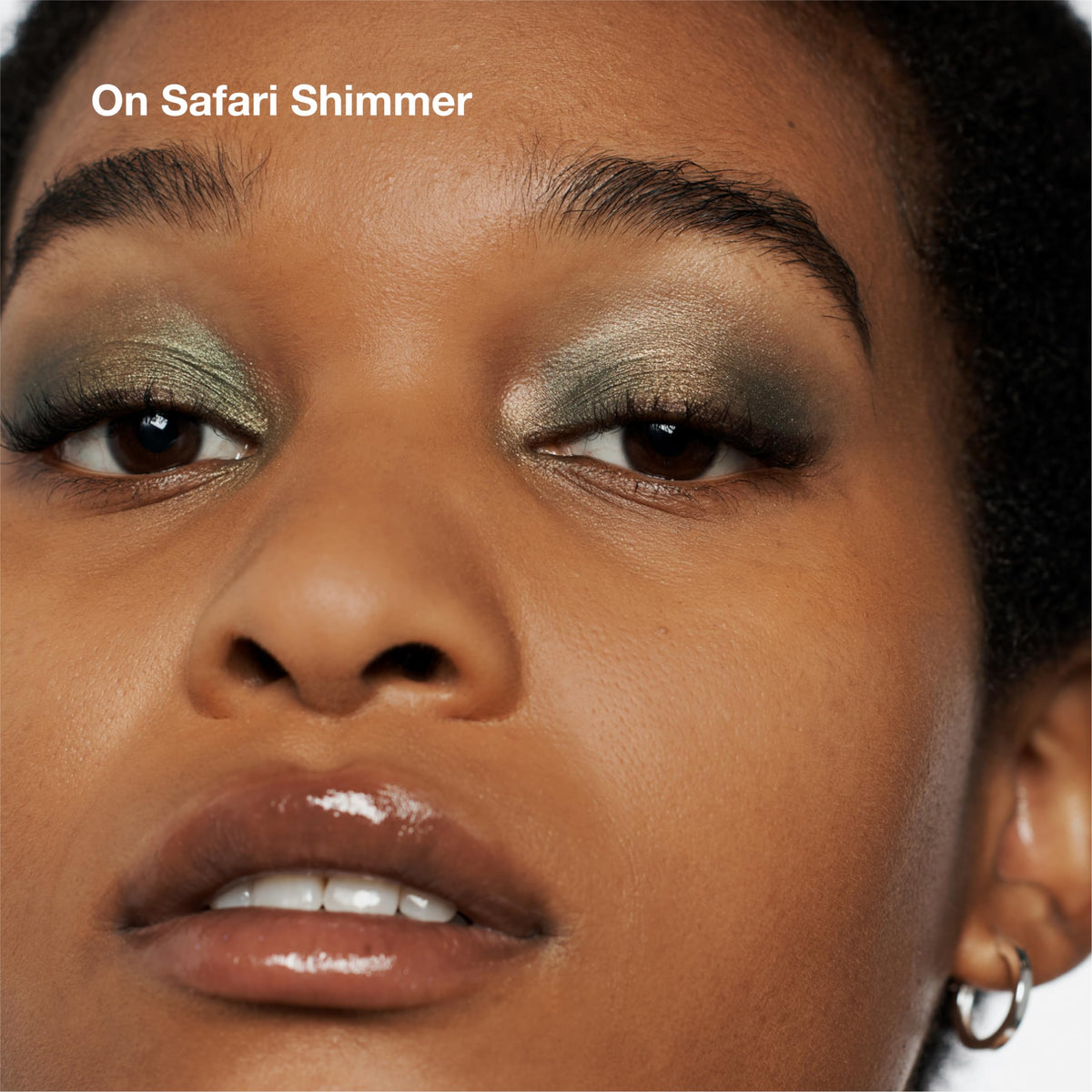 Clinique swatches on skin showing buildable pigmentation and crease-resistant benefit