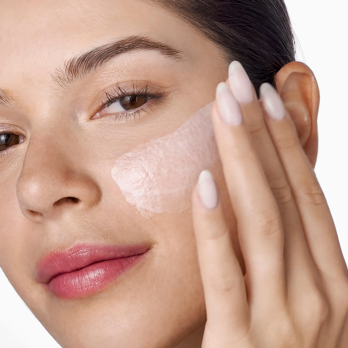 Clinique travel trio next to passport illustrating portable hydration benefits
