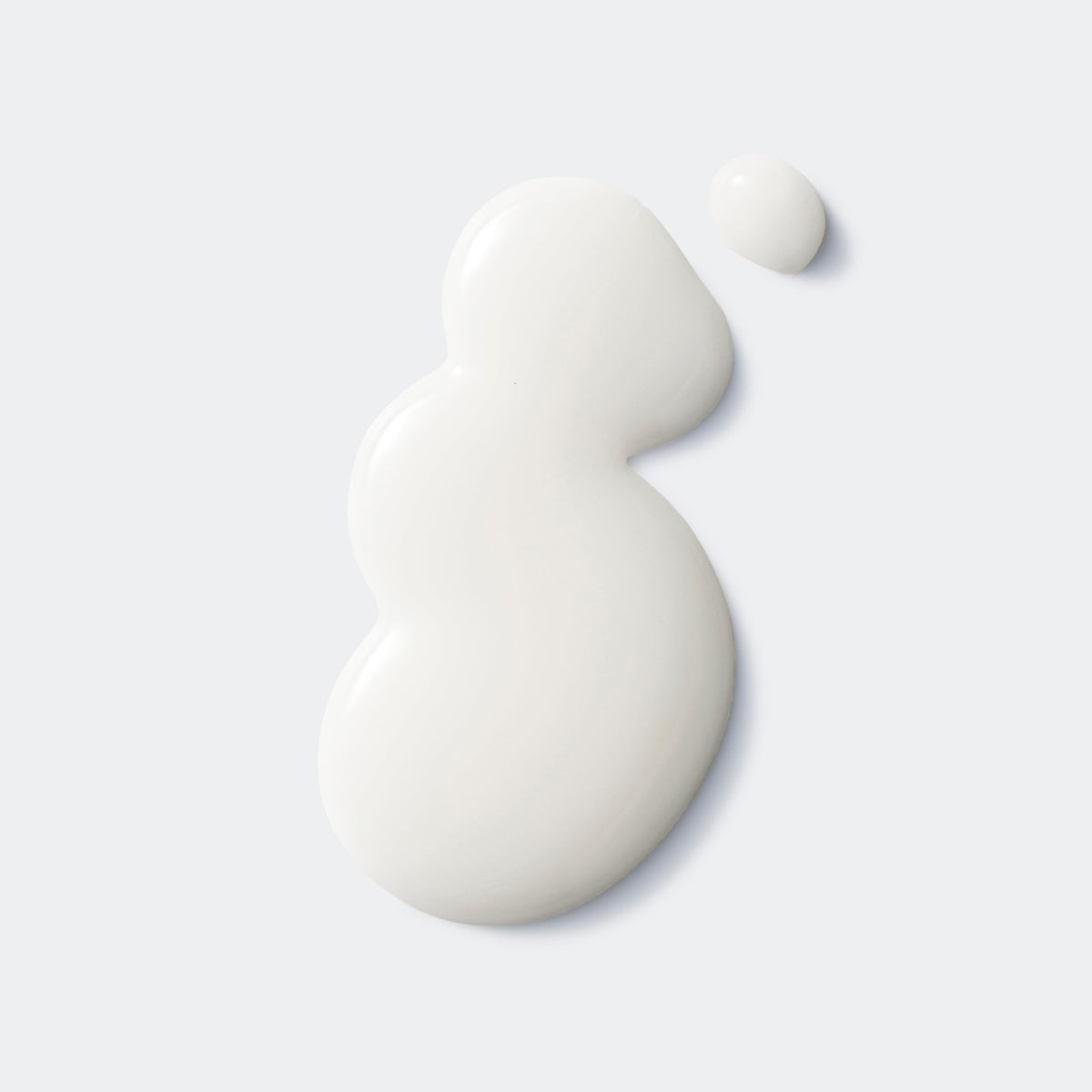 Clinique drop on fingertip close-up showing concentrated formula for targeted renewal