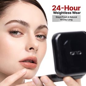 CLIO PROFESSIONAL applying cushion to cheek for even coverage and natural matte finish benefit