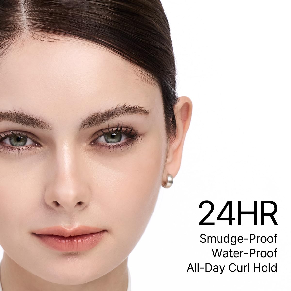 CLIO PROFESSIONAL tube held in hand to show compact size and portability