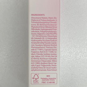 CLIO PROFESSIONAL size comparison next to coin illustrating compact travel-friendly tube