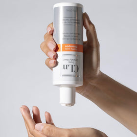 CLn next to common 8 fl oz items for scale to show compact travel-friendly size