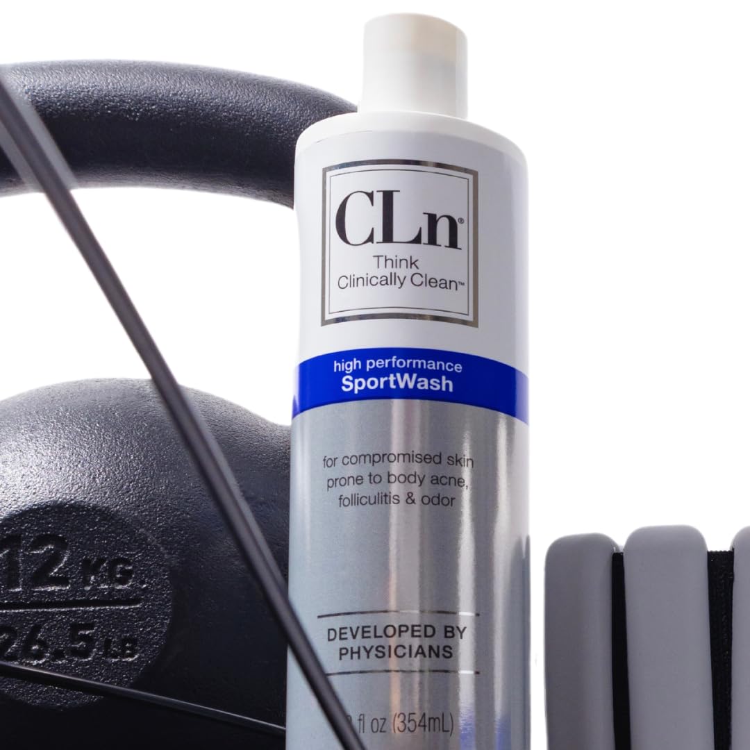 CLn SportWash 12 fl oz bottle next to hand for scale and portability