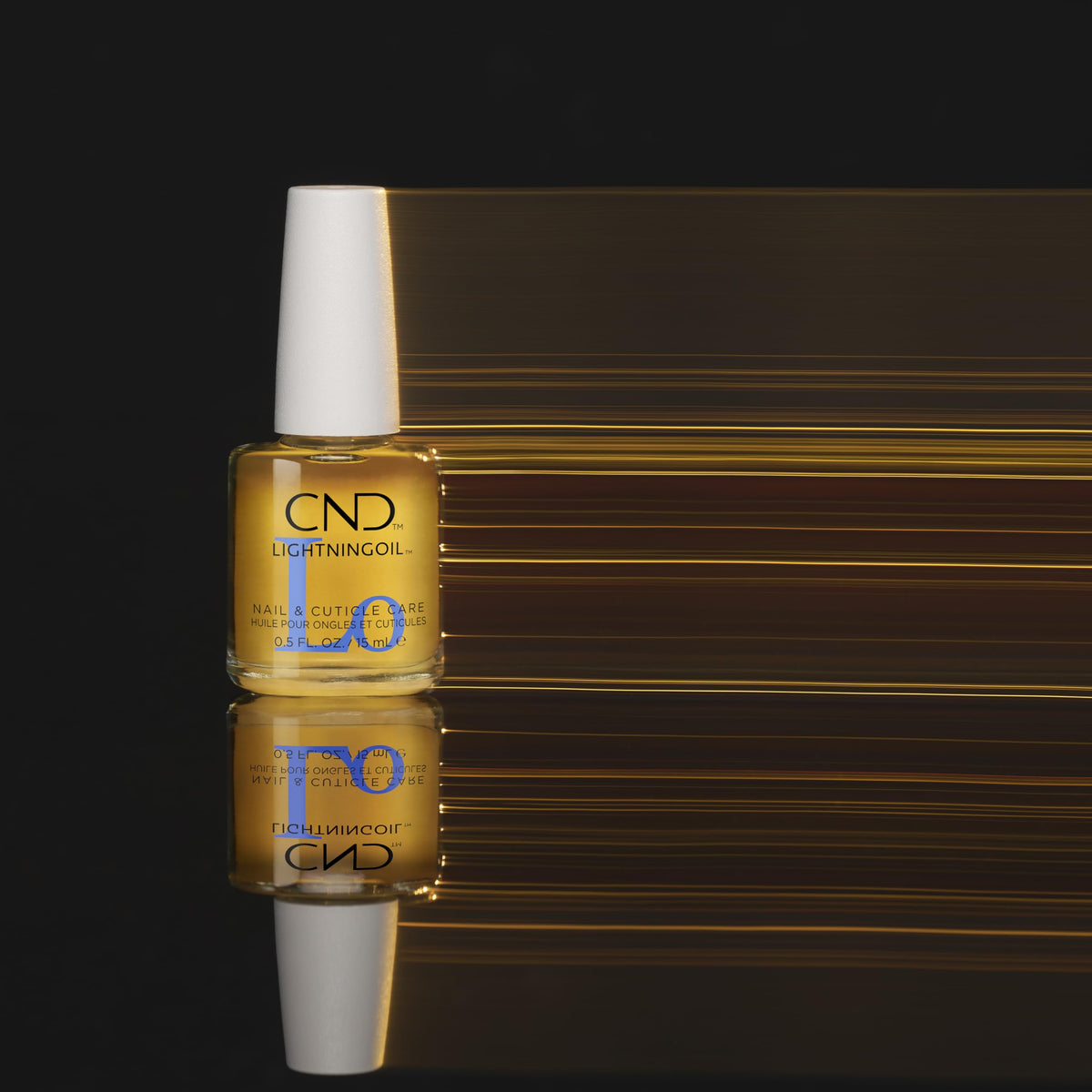 CND LIGHTNINGOIL on a vanity with other grooming items showing daily routine benefit