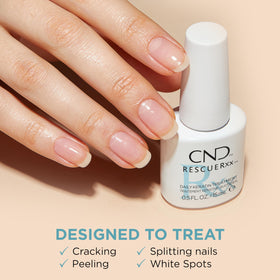 Close-up of CND RescueRxx oil texture on fingertip, highlights moisturizing jojoba and almond oils