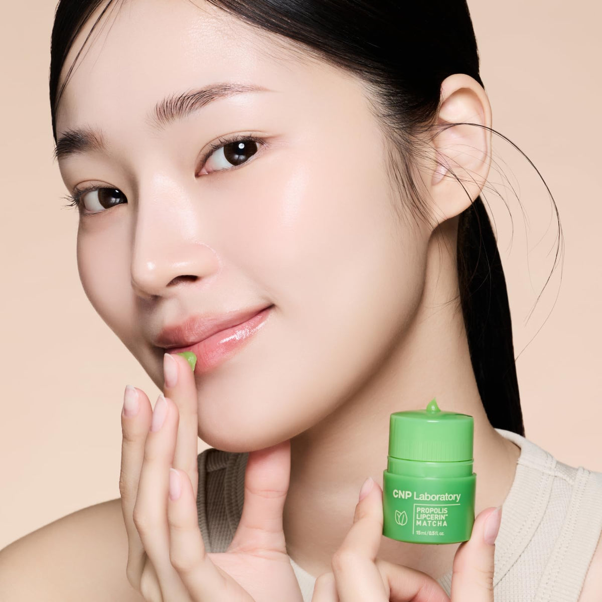 CNP on-lips application photo showing smooth finish and lasting hydration
