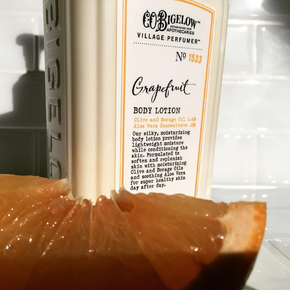 C. O. Bigelow on bathroom shelf styling suggesting everyday routine use