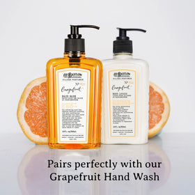 C. O. Bigelow bottle next to fresh grapefruit emphasizing zesty aroma