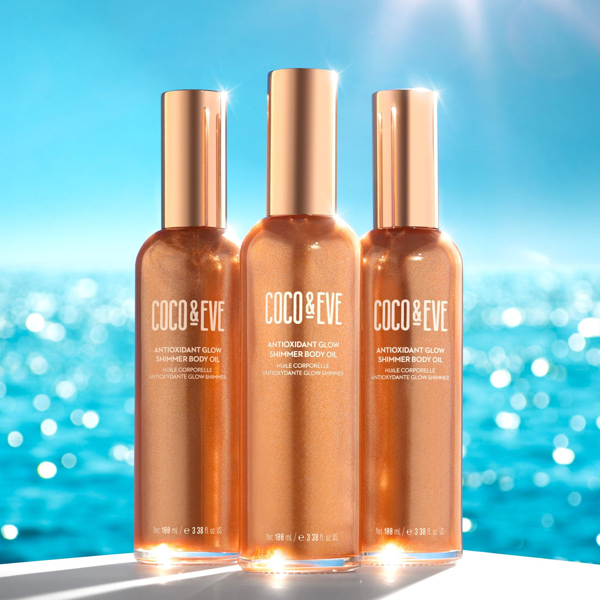 Coco & Eve evening look on shoulders creating radiant camera-ready sheen