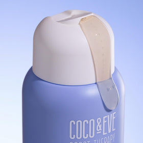 Coco & Eve shampoo texture on fingers showing lightweight, non-greasy feel