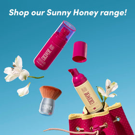 Coco & Eve travel-size bottle beside suitcase showing portable tanning convenience
