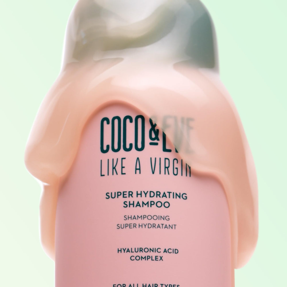 Coco & Eve lather on wet hair demonstrating gentle cleansing and slip