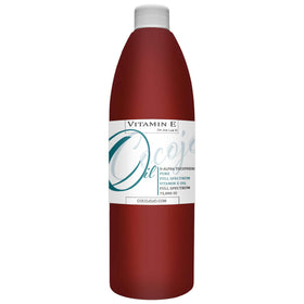 cocojojo oil pouring from dropper showing smooth cold-pressed texture