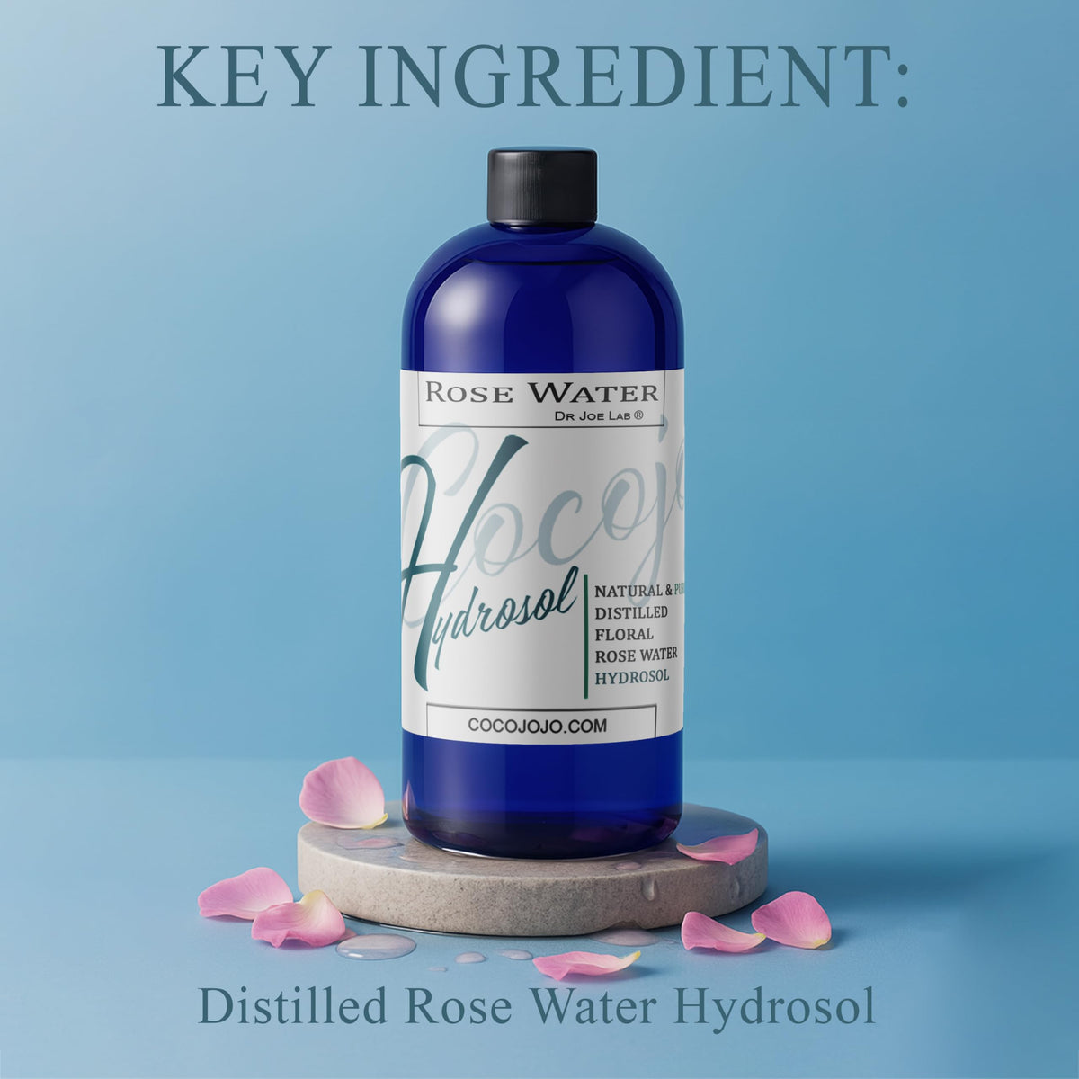 COCOJOJO bottle spraying fine mist demonstrating even coverage and instant hydration benefit