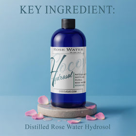 COCOJOJO bottle spraying fine mist demonstrating even coverage and instant hydration benefit