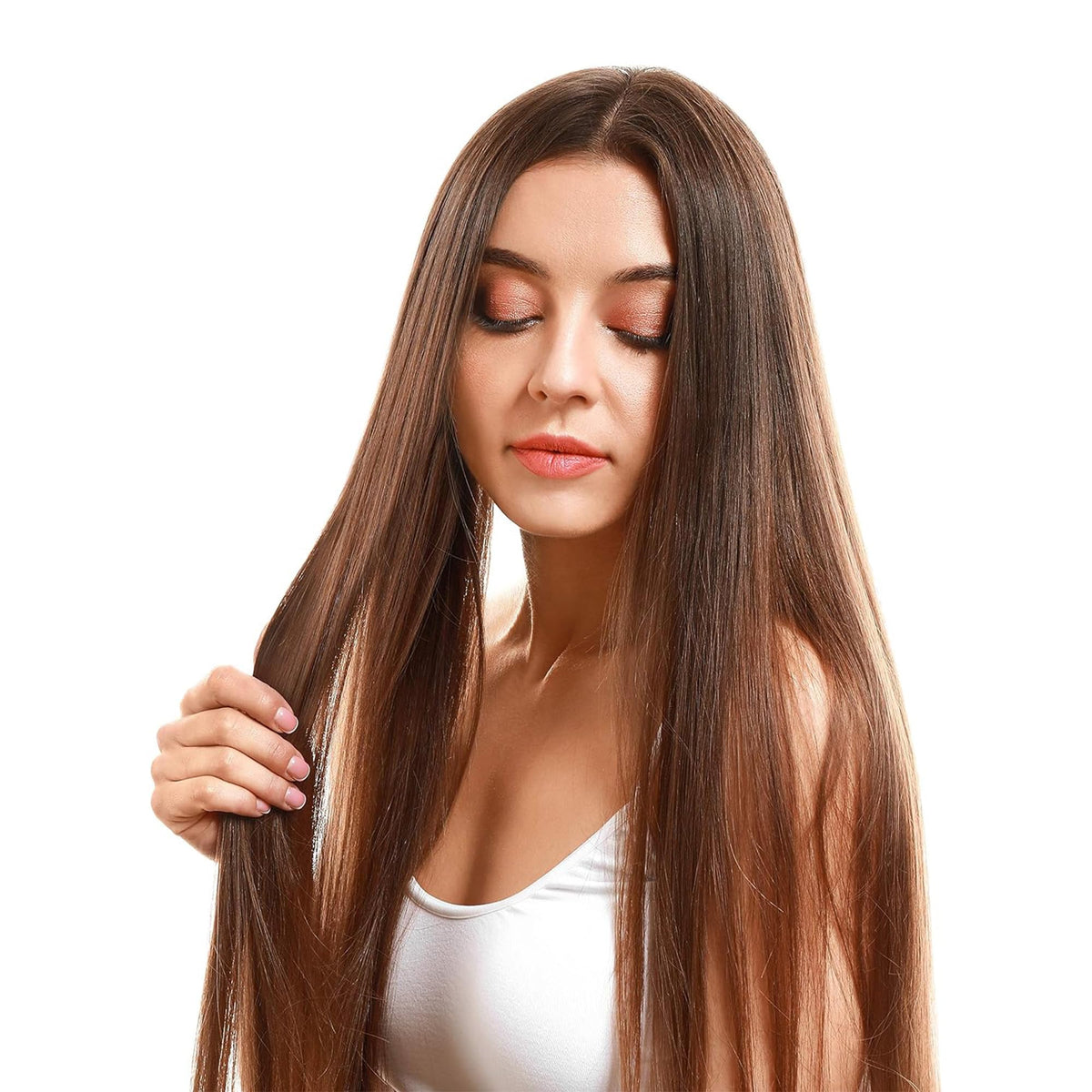 cocojojo oil applied to hair ends to reduce frizz and add shine