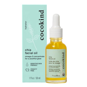 Cocokind chia facial oil front bottle showing label and chamomile, highlights clean packaging