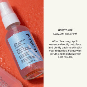 Cocokind bottle held in hand to show size and travel-friendly hydrating mist benefit