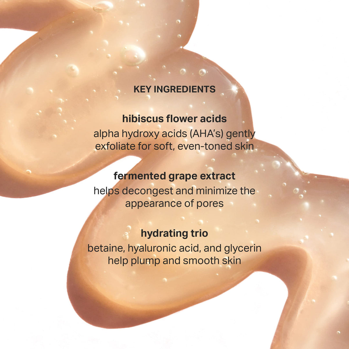 Cocokind ingredients label close-up, highlights hibiscus AHA and fermented grape extract