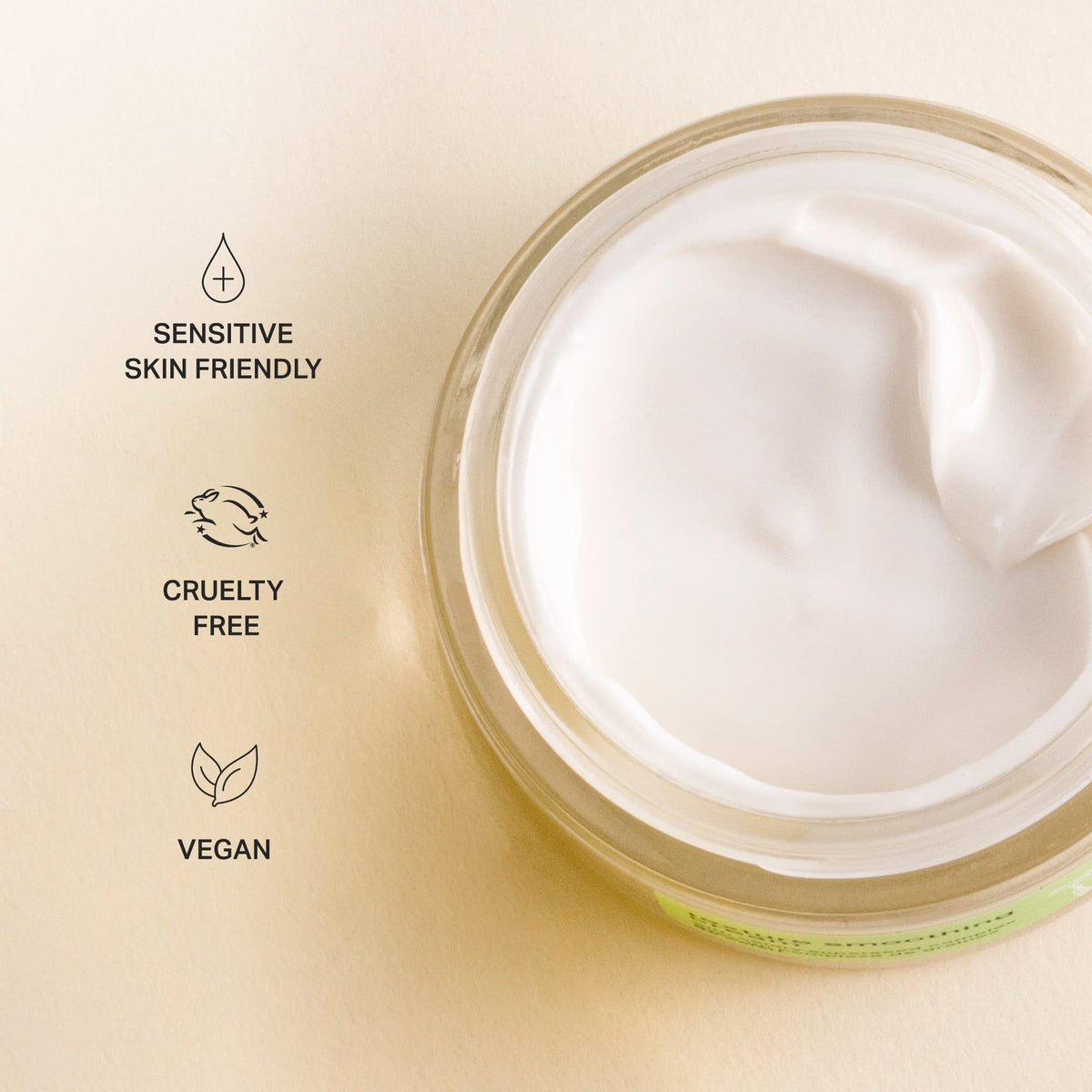 Cocokind pump dispensing cream into hand demonstrating easy spreadability