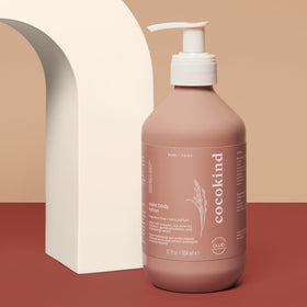 Cocokind lotion texture on hand showing lightweight absorption benefit