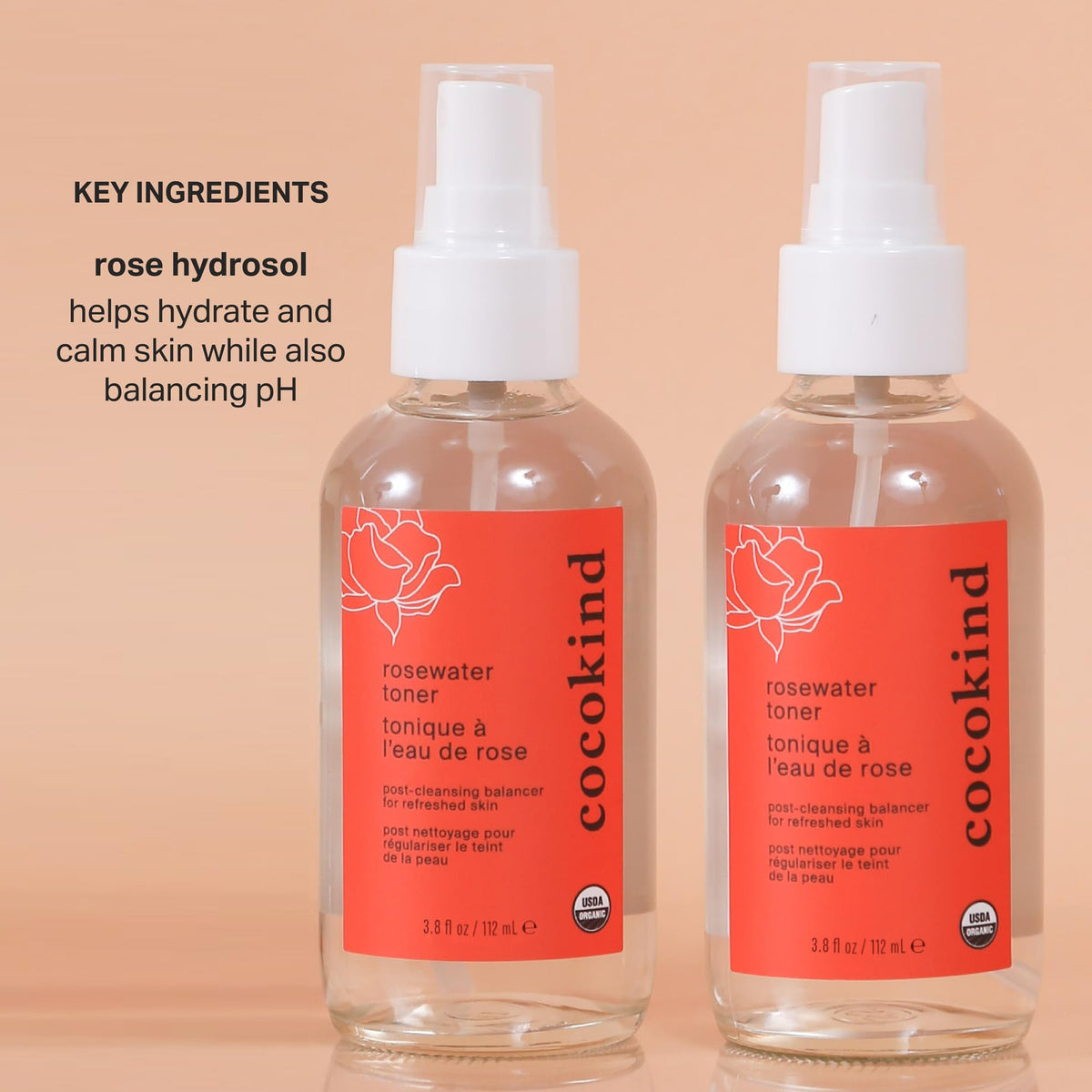 Cocokind bottle held in hand to show 4 fl oz size and travel-friendly benefit